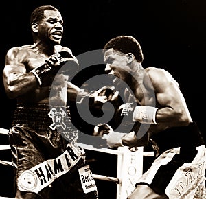 Hank Lundy hits Dannie Williams with a body shot.