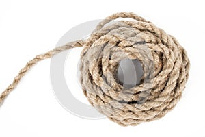 Hank of rough rope isolated on a white background