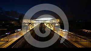 Hannover Messe-Laatzen railway station near the Hanover fairground at evening.