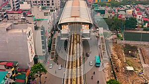 HANOI, VIETNAM - APRIL, 2020: Aerial drone view of the railroad station and railways in one of the districts of Hanoi.