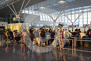 Hanoi, Vietnam - July 12, 2015: Crowded people waiting at check-in area at Noi Bai International Airport, the biggest airport in n