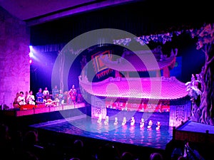 General view of stage with musicians on the left performing live traditional Vietnamese music at Thang Long Water Puppet Theater s
