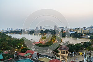 Hanoi, Vietnam - Mar 10, 2018: Aerial skyline view of Hoan Kiem lake or Ho Guom, Sword lake. Hoan Kiem is center of Hanoi city.