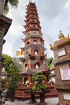 Hanoi, Vietnam - May 28, 2023: The Tran Quoc Pagoda, situated on a small island in Hanoi\'s West Lake, is an ancient Buddhist photo