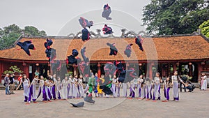 Vietnamese students celebrating graduation at the temple of literature