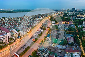 Hanoi, Vietnam - Sep 19, 2015: Aerial skyline view of Nguyen Khoai street with Vinh Tuy bridge crossing Red River on background. H