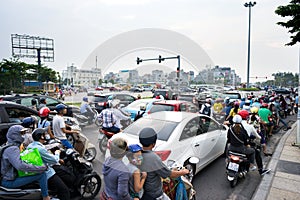 Hanoi, Vietnam - Sep 4, 2016: Cars and motorcycles stuck at traffic jam, rush hour in Co Linh street, Long Bien district