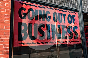 Going Out of Business Sign in Window