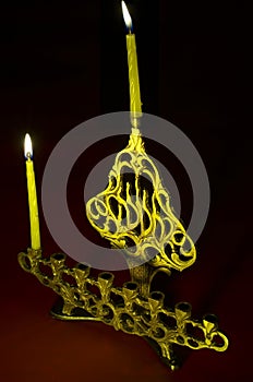 Hanuka candles in hanukkiya photo