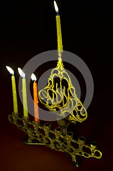 Hanuka candles in hanukkiya photo