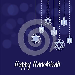 Hanukkah blue background with hanging star of David and dreidel