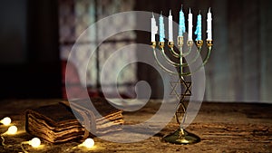 Hanukkah candlestick with book on table