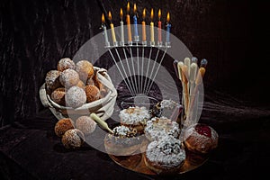 Hanukkah, candlestick, buns. Everything for a holiday with family and for guests. Joy and happiness.