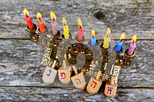 Hanukkah Chanukah Jewish holiday background with Hanukah Chanukkah menorah Judaism candelabra burning candles and traditional