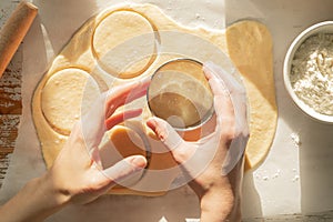 Hanukkah concept - making sufganiot donuts