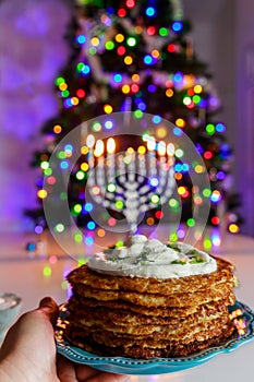 For Hanukkah, crispy potato latkes are traditional Jewish food dish.