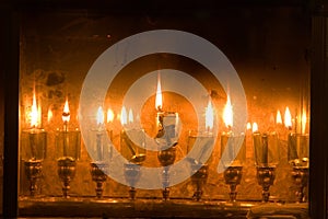 Hanukkah oil candles, lighted photo
