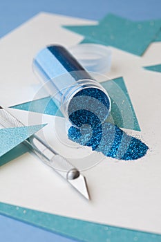 Hanukkah paper crafts using glitter and mat knife supplies making Star of David decorations ornaments