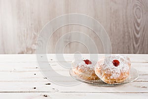 Hanukkah sufganiyot. Traditional Jewish donuts for Hanukkah. photo