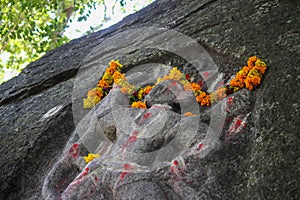 Hanuman temple scarped in rock near hills