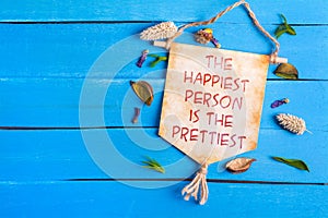 The happiest person is the prettiest text on Paper Scroll