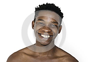 Happiness african man smiling bare chest studio portrait