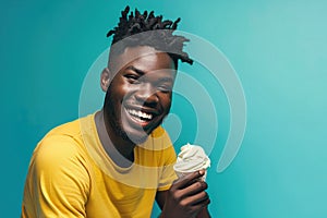 Happiness African Yearold Man Eats Vanilla Ice Cream On Turquoise Background photo