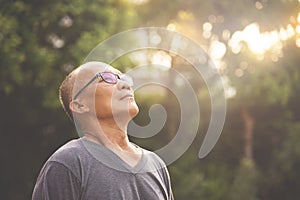 Happiness Asian senior man relaxing