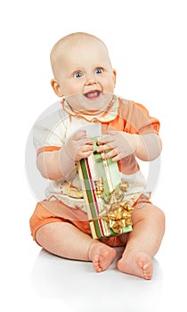 Happiness child keeps gift box