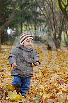 Happiness child playing in forest