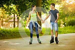 Happiness couple roller-skating