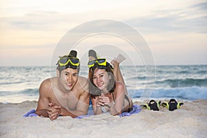 Happiness couple in romantic scene on the beach at sunset. Love and valentine concept