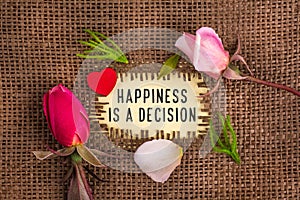Happiness is a decision written in hole on the burlap