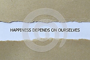 happiness depends on ourselves on white paper