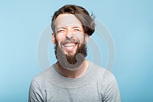 Happiness enjoyment laugh bearded exhilarated man