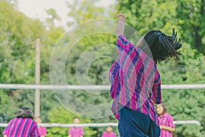 Happiness group of teenage friends playing volleyball