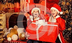 Happiness and joy. Santa crew. Girls friends sisters Santa claus costumes received gift. Santa party. Happy new year