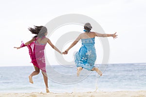 Happiness Mother and Girl Jumping