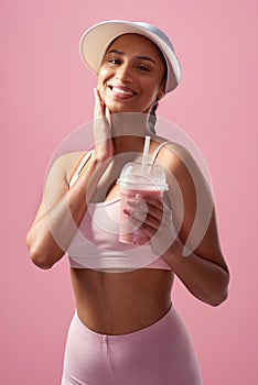 Happiness is next to healthiness. Cropped portrait of an attractive and sporty young woman posing with a smoothie in