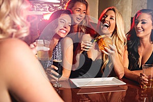 Happiness is a night out with the girls. young women partying in a nightclub.