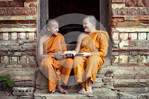 Happiness of Novice monk buddhist religion buddhism in Thailand