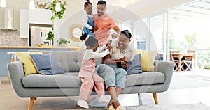 Happiness, playful parents and kids on sofa, black family having fun and smile in home together. Mother, father and