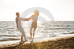 Happiness and romantic Scene of love couples partners on the Beach