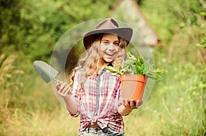 Happiness. spring season. hellow summer. small girl planting with shovel. earth day. environment ecology. green nature