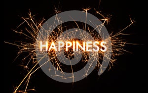 HAPPINESS title word in glowing sparkler