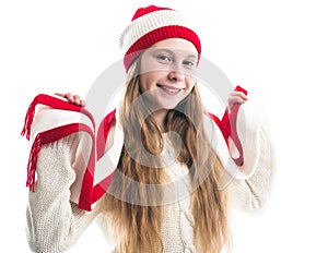 Happiness winter holidays christmas. Teenager concept - smiling young woman in red hat, scarf and over white background.