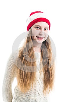 Happiness winter holidays christmas. Teenager concept - smiling young woman in red hat, scarf and over white background.