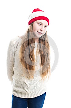 Happiness winter holidays christmas. Teenager concept - smiling young woman in red hat, scarf and over white background.