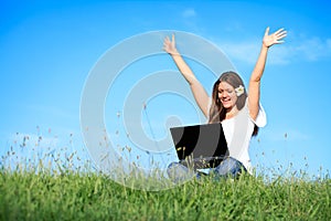 Happiness woman working with laptop, outdoor
