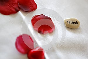 Happiness written on a stone